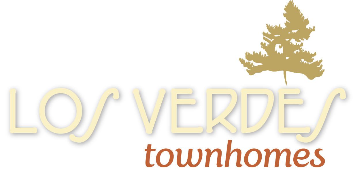 the logo for loveland townhomes with a maple leaf